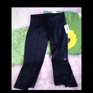 Brand new Lotus Wear caprIs size 2